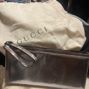 COPY - Gucci Wristlet in shiny silver.